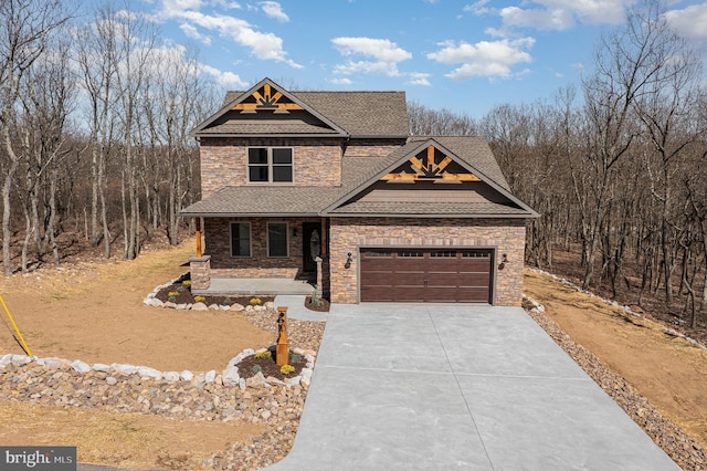 107 S Honeysuckle Dr, Hazle Township, PA 18202 - craftsman-style house featuring stone siding, a shingled roof, concrete driveway, covered porch, and an attached garage