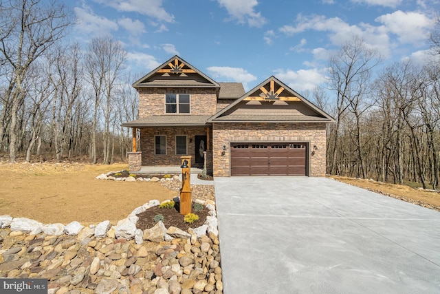 107 S Honeysuckle Dr, Hazle Township, PA 18202 - craftsman house with stone siding, concrete driveway, a porch, and an attached garage