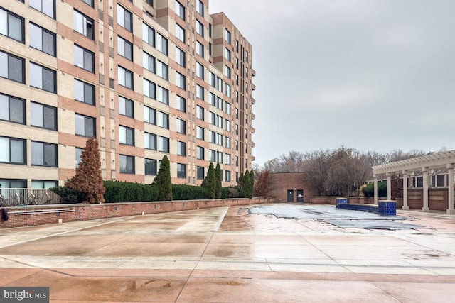 view of property featuring central AC unit