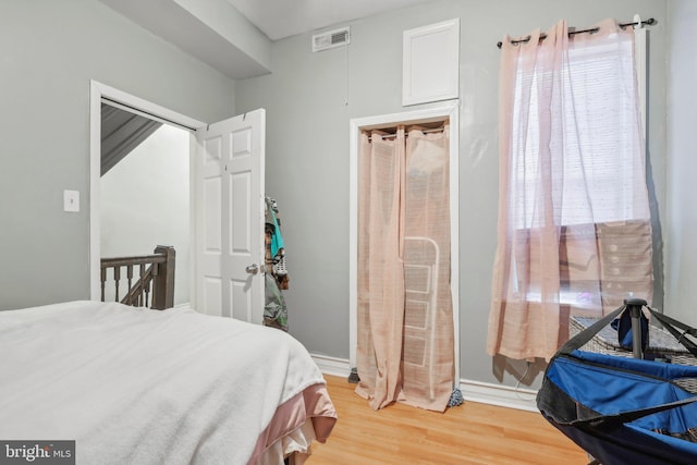 bedroom featuring hardwood / wood-style flooring