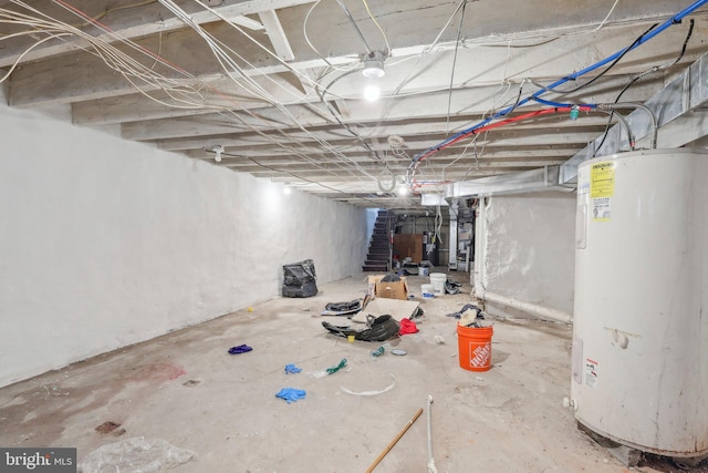 basement featuring electric water heater