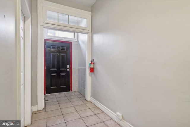 entrance foyer featuring light tile patterned flooring