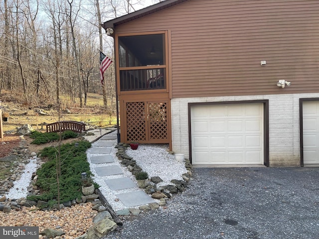 exterior space with a garage