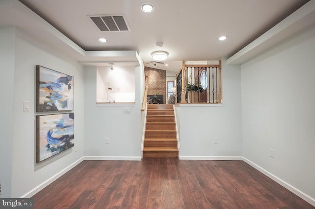 interior space with dark hardwood / wood-style floors