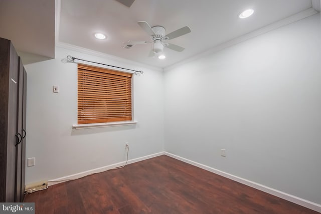 spare room featuring ceiling fan, hardwood / wood-style floors, and ornamental molding