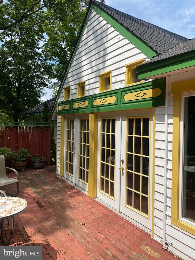 wooden terrace featuring french doors