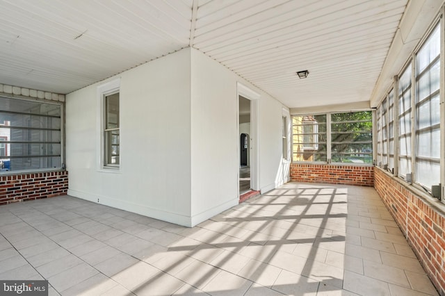 view of unfurnished sunroom