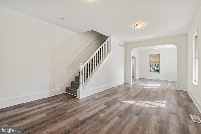 entrance foyer featuring wood-type flooring