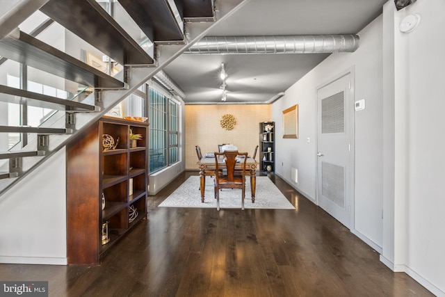 dining room featuring dark wood-type flooring