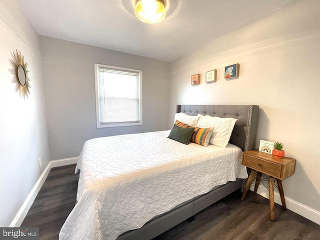 bedroom featuring dark hardwood / wood-style floors