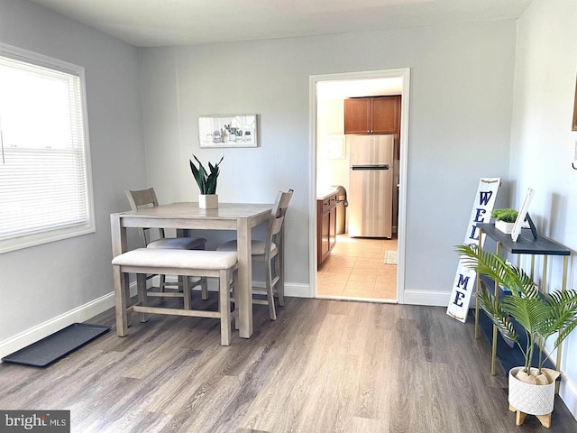 dining area featuring hardwood / wood-style floors