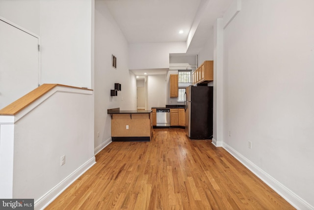 unfurnished living room with light hardwood / wood-style flooring