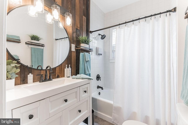 bathroom featuring shower / bathtub combination with curtain and vanity