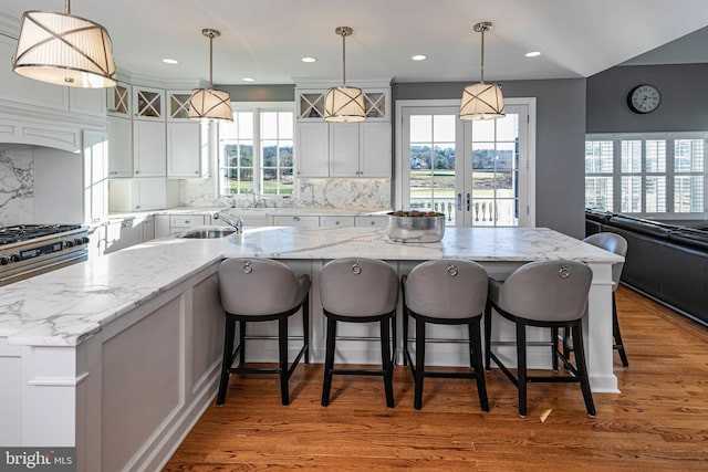 kitchen featuring pendant lighting and a spacious island