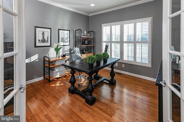 office space with french doors, ornamental molding, and hardwood / wood-style flooring