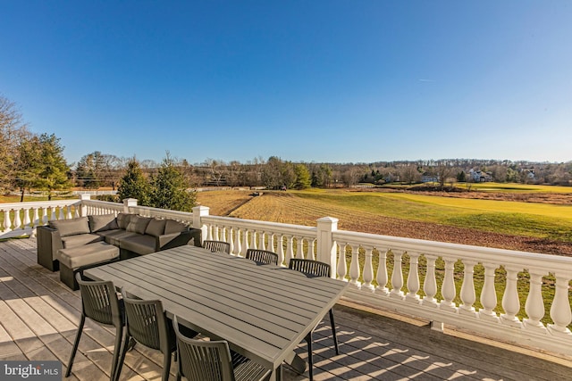 deck featuring outdoor lounge area