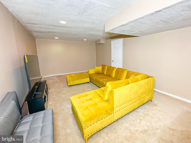 carpeted living room with a textured ceiling