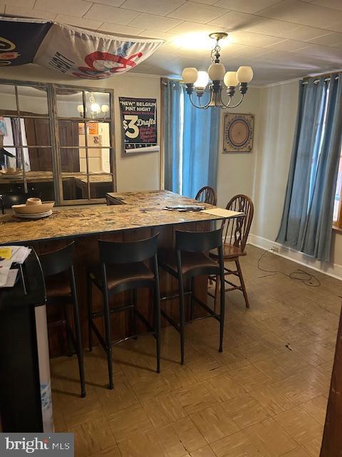 dining area featuring a chandelier