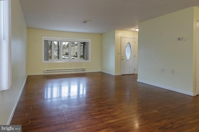 interior space featuring dark hardwood / wood-style floors and baseboard heating