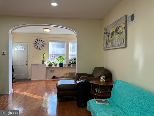 sitting room featuring hardwood / wood-style flooring