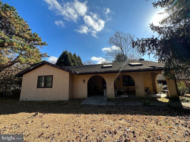 view of front of house featuring a patio