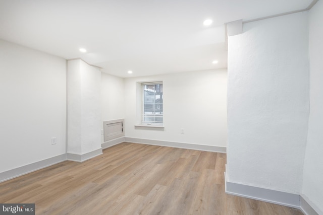 unfurnished room featuring light wood-type flooring