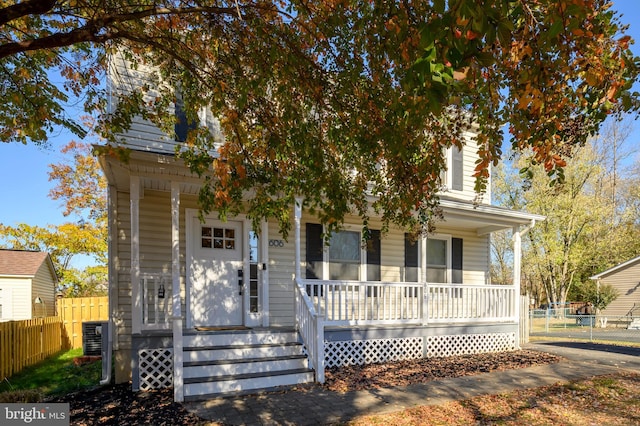 obstructed view of property with a porch