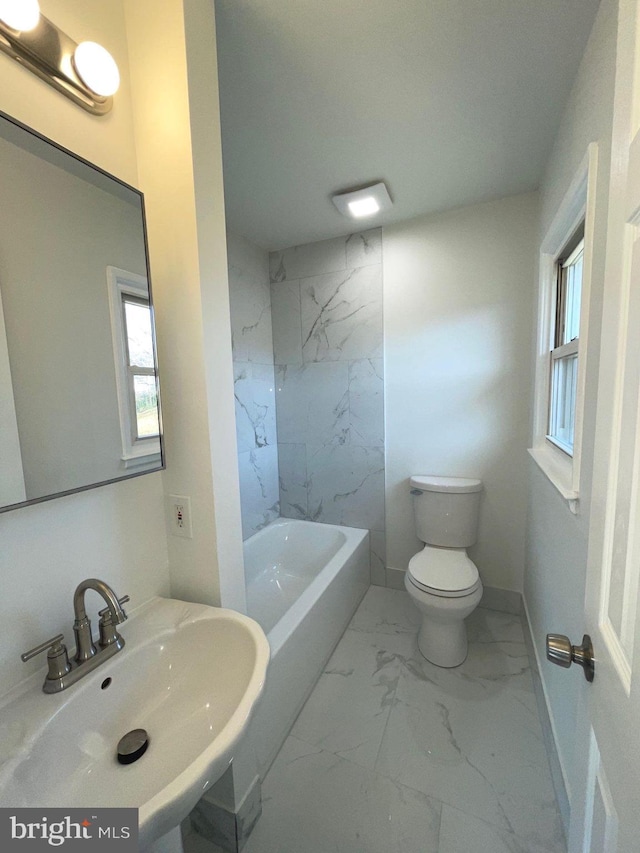 bathroom with toilet and sink