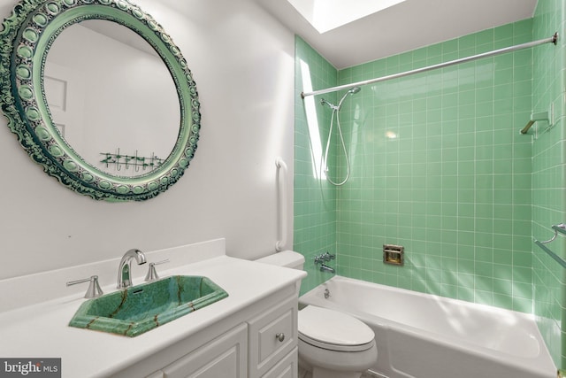 full bath featuring vanity, toilet, and shower / washtub combination