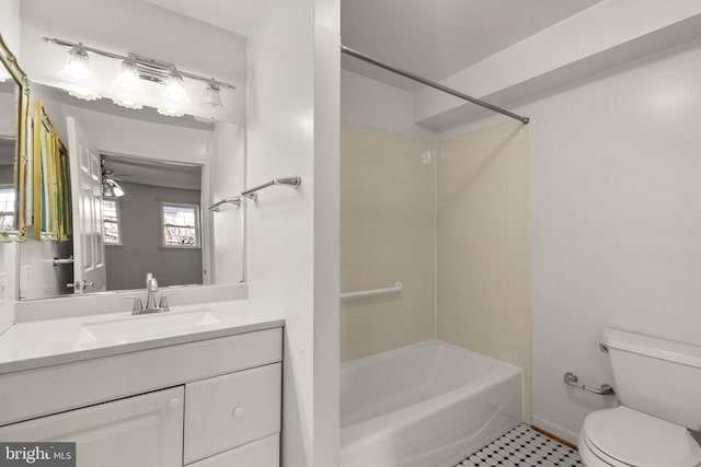 full bath with vanity, toilet, and bathtub / shower combination