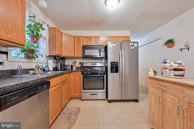 kitchen featuring sink and appliances with stainless steel finishes