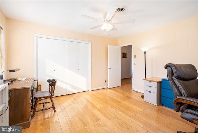 office area featuring ceiling fan and light hardwood / wood-style floors