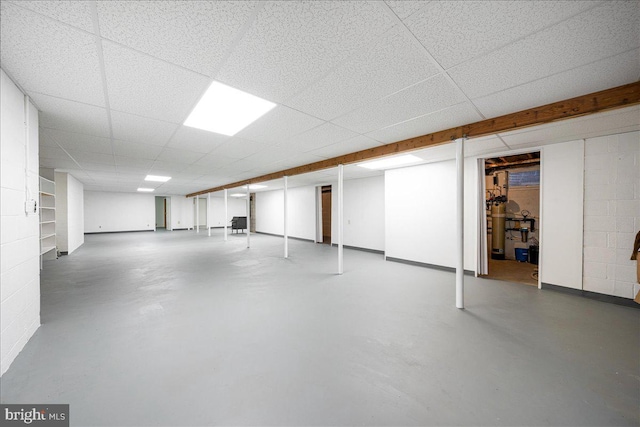 basement with a drop ceiling