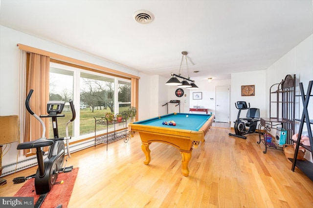 playroom with a baseboard heating unit, billiards, and light hardwood / wood-style flooring