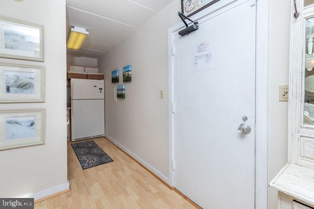 hall featuring light hardwood / wood-style floors