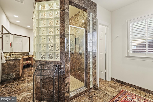 bathroom featuring an enclosed shower