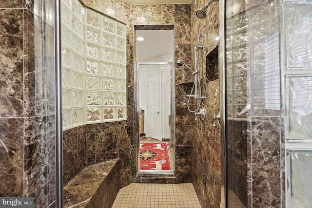 bathroom featuring tiled shower