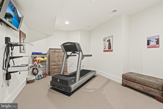 exercise room with carpet floors