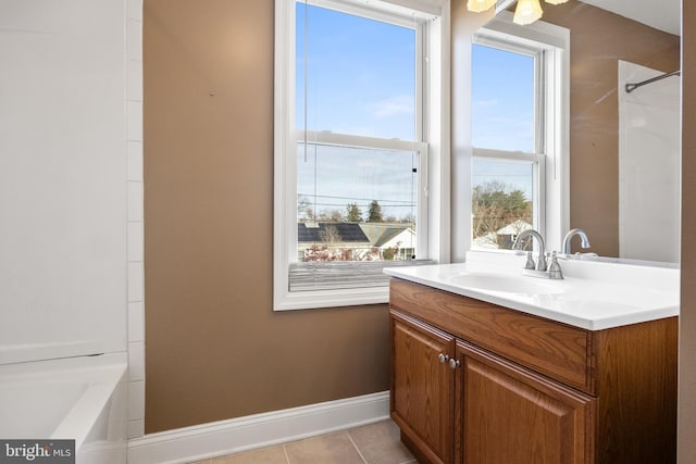 bathroom with vanity, tile patterned flooring, and shower / tub combination