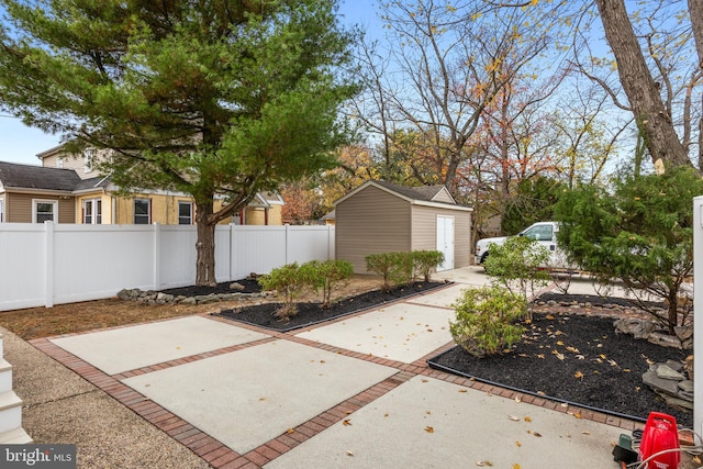 view of patio / terrace with an outbuilding