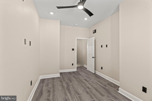 interior space with hardwood / wood-style floors and ceiling fan