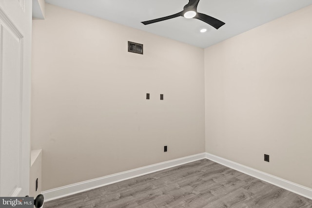 washroom featuring ceiling fan and light hardwood / wood-style floors