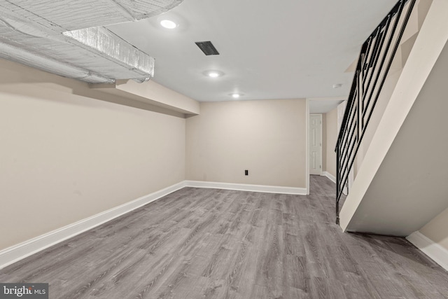 basement with light wood-type flooring