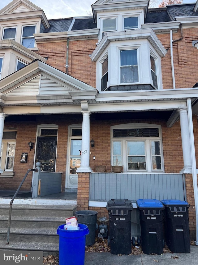 doorway to property featuring covered porch