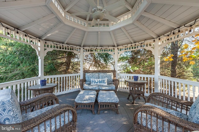 wooden deck featuring a gazebo