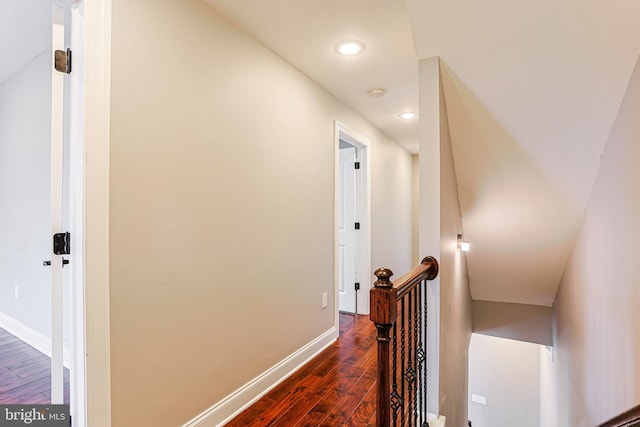 hallway with dark wood-type flooring