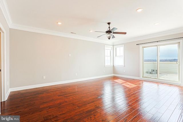 unfurnished room featuring ceiling fan, ornamental molding, and dark hardwood / wood-style flooring