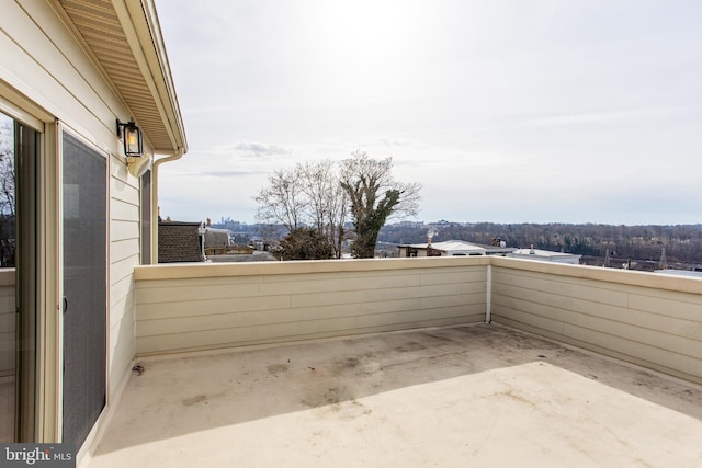 view of patio / terrace with a balcony