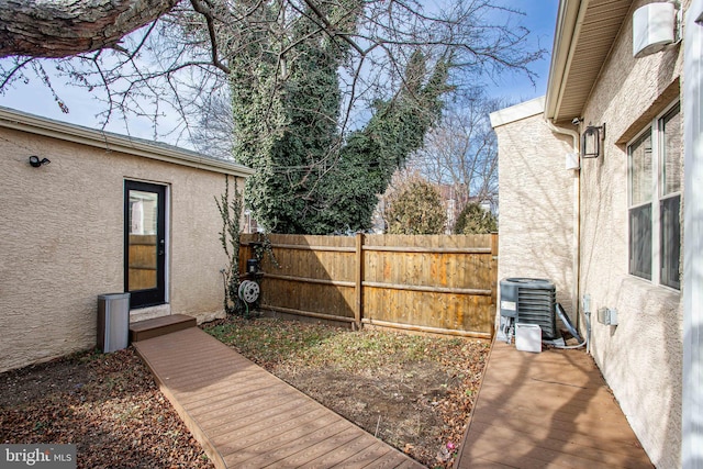 view of yard with central AC unit