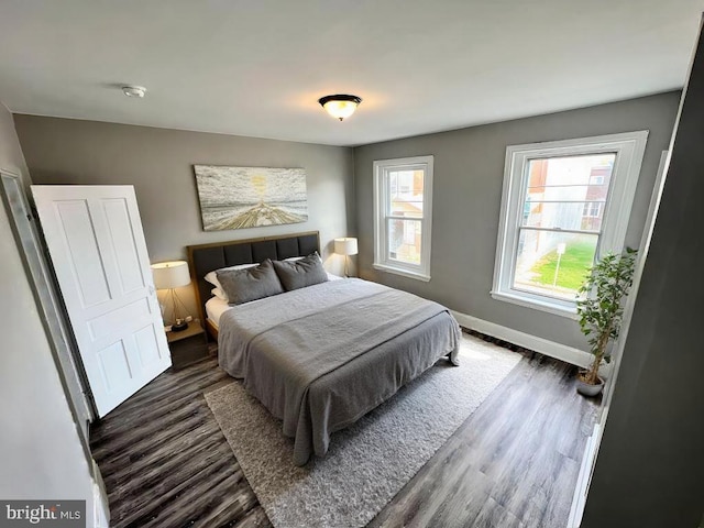 bedroom featuring dark hardwood / wood-style floors